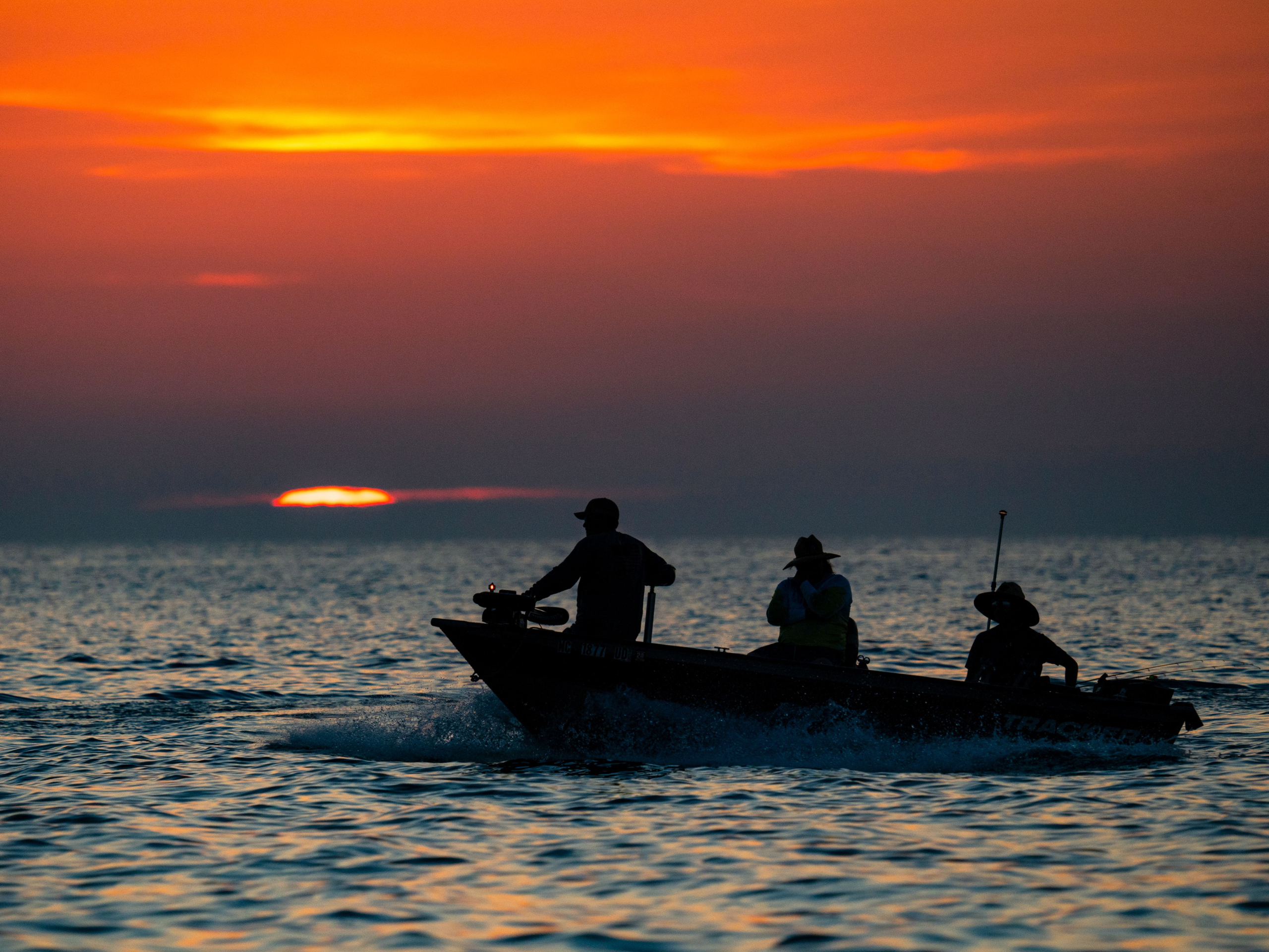 snorkelling-at-the-tug-boat-wreck-with-lots-of-fis-2026-03-26-00-18-15-utc_0000_beautiful-shot-of-a-people-boat-in-the-s
